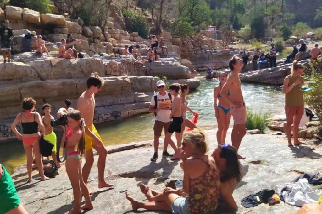 Tourists swimming in Paradise Valley Agadir