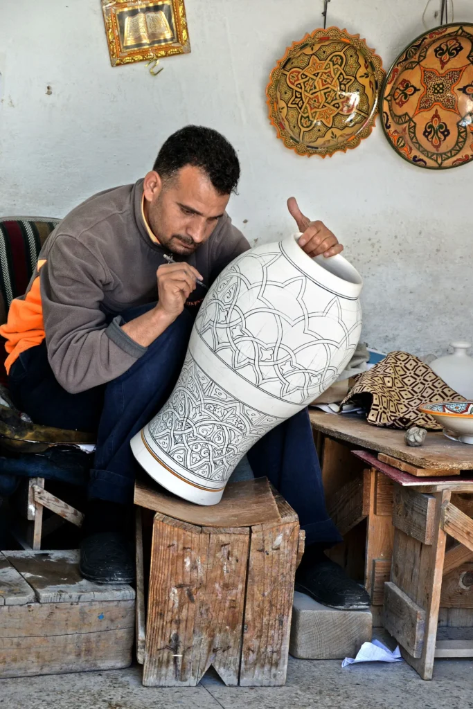 Workshops in Agadir Moroccan artisan crafting pottery