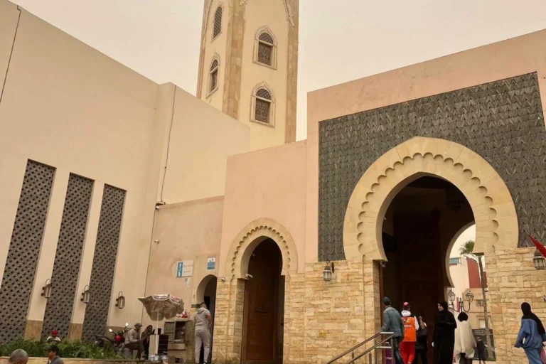Visitors at the entrance of the Grand Mosque of Agadir